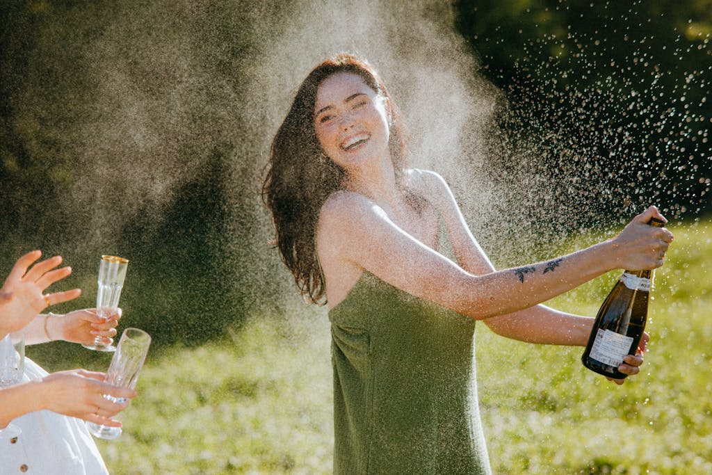 champagne popping in beautiful setting
